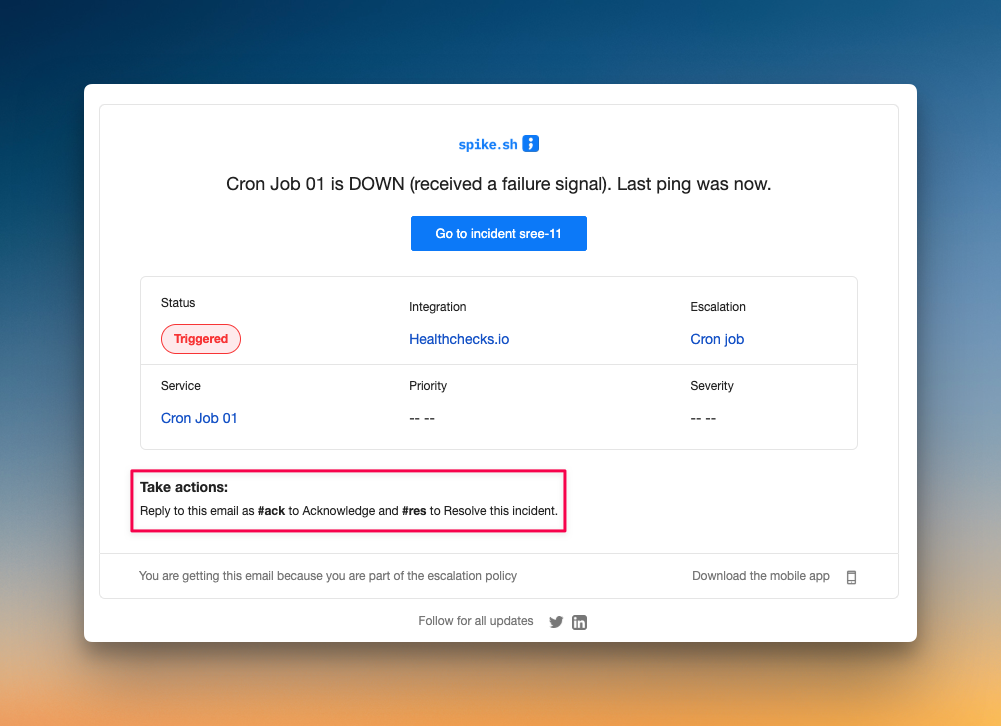 Spike's email alert with options to acknowledge or resolve